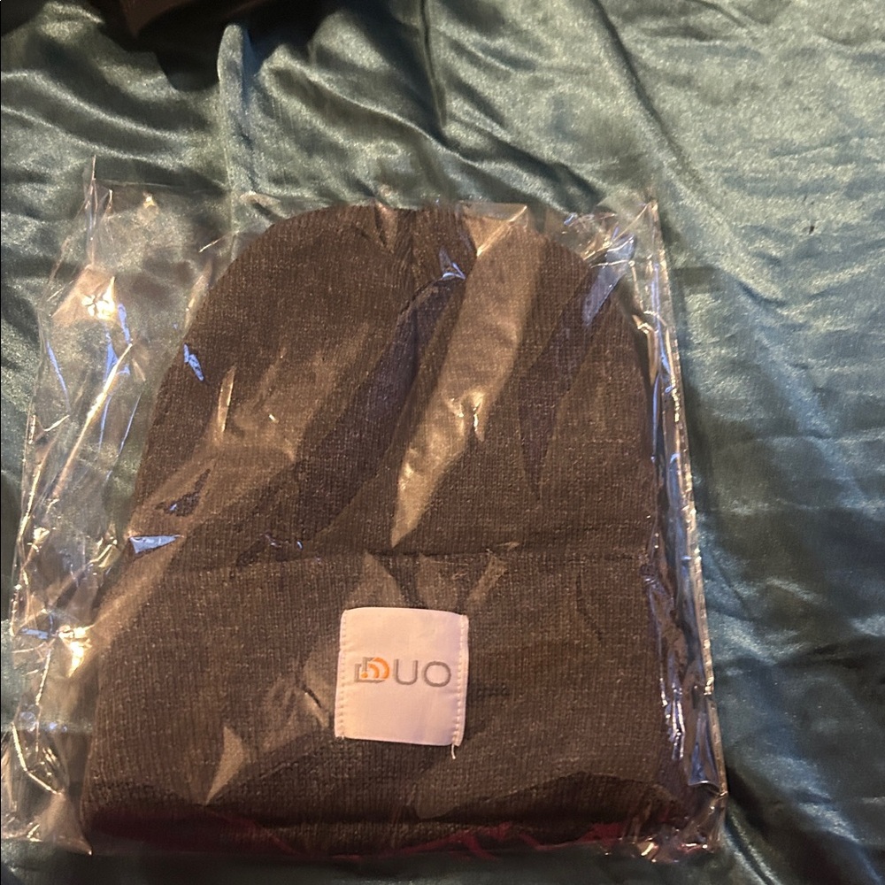 Brand new. Gray Beanie. Buy the other to match with your duo for Valentine’s Day
